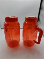 2 red water jugs