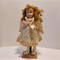 Red Head Porcelain Doll on Stad
