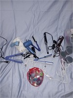 Lot of hair styling utensils and accessories