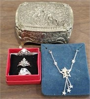 Tin with Necklace and 3- Rings