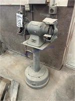 Pedestal grinder on base