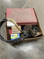 box of assorted tire repair supplies