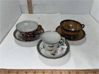 3 Asian tea cups with saucers