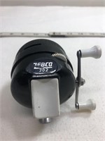 Zebco 202 reel with booklet