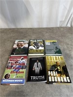 Signed books by Kordell Stewert, Dave Robinson,