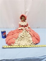 Plastic doll with crocheted dress and hat