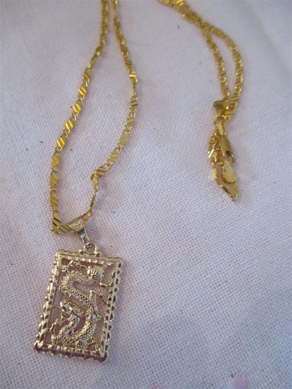 LOT 76 IMPORTED PENDANT AND CHAIN