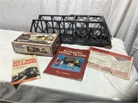 Model train books and bridge