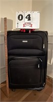 Calvin Klein pull behind suitcase