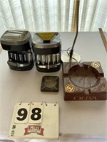 Coin counters, ashtrays, desk lamp