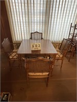 Faux bamboo table with 4 chairs, (scratches on