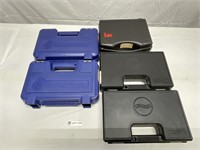 2 Smith and Wesson, one HK and 2 Walther cases