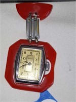 VTG BAKELITE PIN WITH DANGLING WATCH