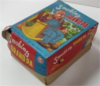 Smoking Grandpa Tin Toy - in Original Box