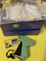 GARMENT TAGGING GUN & A LOT OF CLEAR TAGS