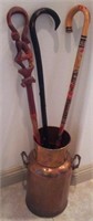 U - WOODEN WALKING CANES AND COPPER HOLDER