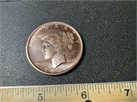 1oz. .999 fine copper round, proof quality