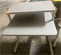 Grey mobile classroom desk with upper shelf
