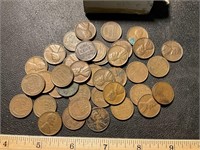 Approximately 39 wheat pennies, as found in a