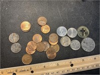 Mixed lot of tokens, nickels, and pennies