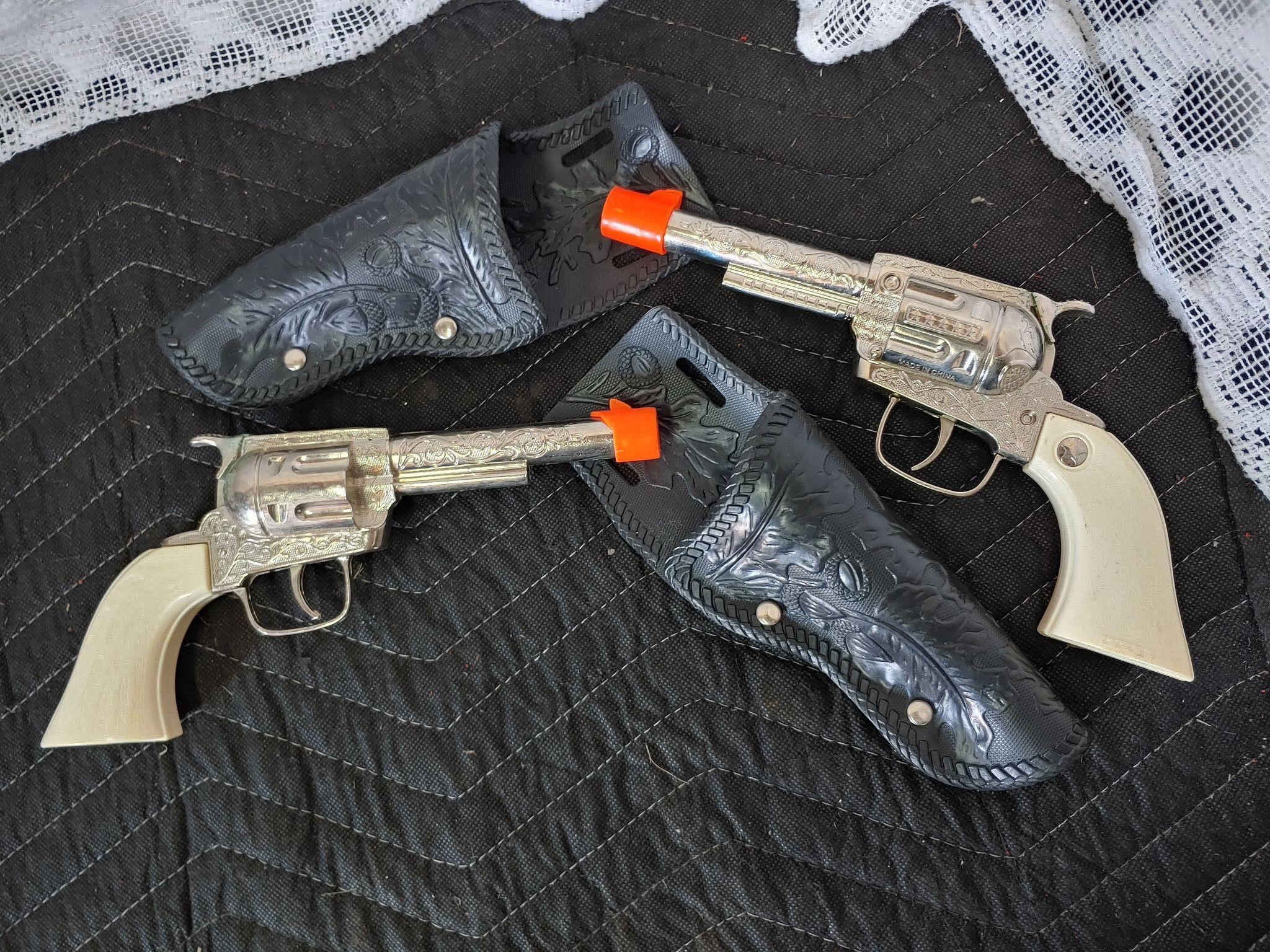 Matched pair of vintage Cap Guns with holsters