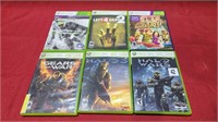 6 xbox 360 games in the case