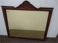 Large antique carved wood frame beveled mirror