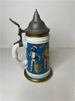 Vintage beer stein knite in armor