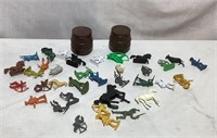 Assortment of small vintage plastic toys