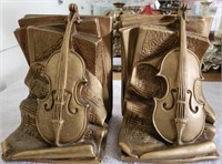 Pair of 1964 Universal Statuary Music Bookends