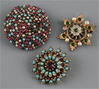 (3) Vintage brooches to include: Starburst gold