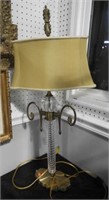Designer style lamp with glass and brass font