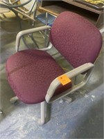 2 Burgundy cloth task chairs mobile base