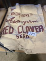 2 Arlington red clover seed sacks.