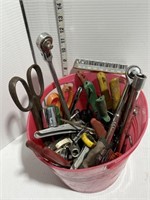 Red plastic pail w/ ratchets, sockets, misc tools