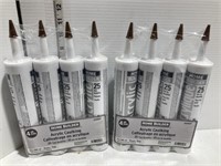 8 tubes of brown acrylic caulking