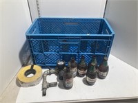 Blue crate with beer bottles and miscellaneous