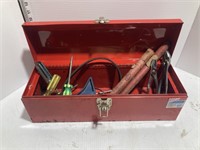 Red metal tool box with contents