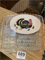 Two large plastic trays, two small plastic trays