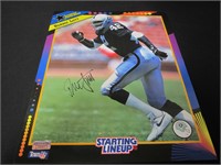 RONNIE LOTT SIGNED STARTING LINEUP POSTER COA