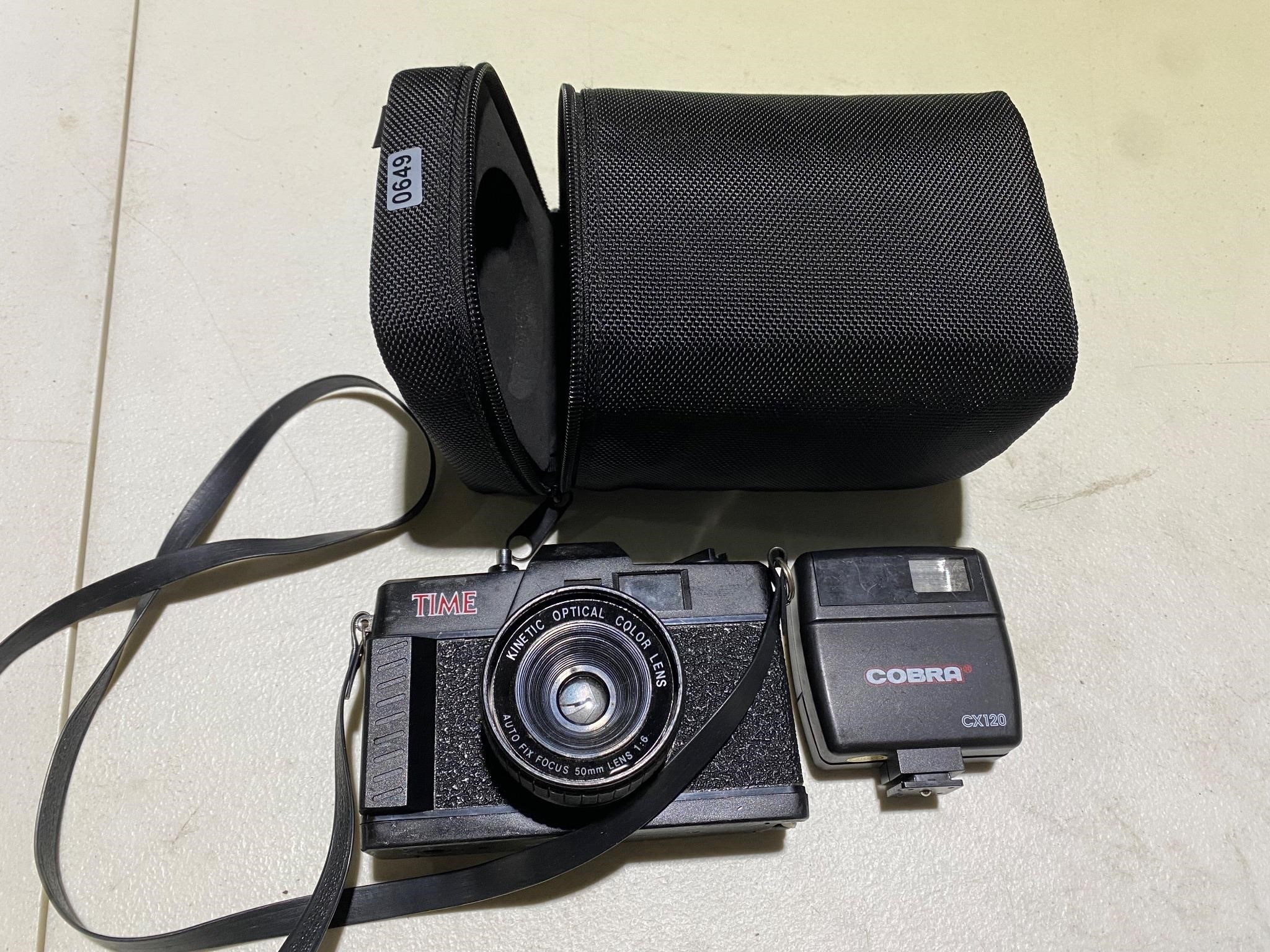 Vintage camera with flash and case