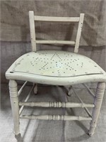 Antique chair with cracked front base frame