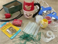 Shriner mug, glue guns with sticks, ribbon, more