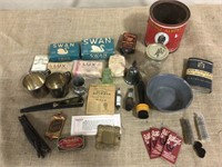 Bars of soap, Tabasco tin, small cups, misc