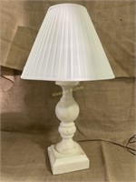 Heavy ceramic lamp with distressed look finish