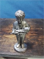 Solid pewter boy holding a train engine 4 inches
