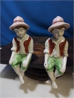 Pair of boys seated made an occupied Japan
