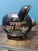 Over the hill fund ceramic piggy bank
