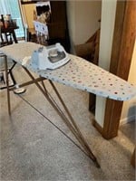 Iron, ironing board, and steamer
