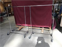 Two Rolling Metal Clothes Racks